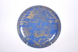 A CHINESE POWDER BLUE AND GILT DISH