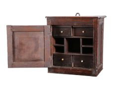 AN OAK SPICE CUPBOARD, LATE 17TH/EARLY 18TH CENTURY