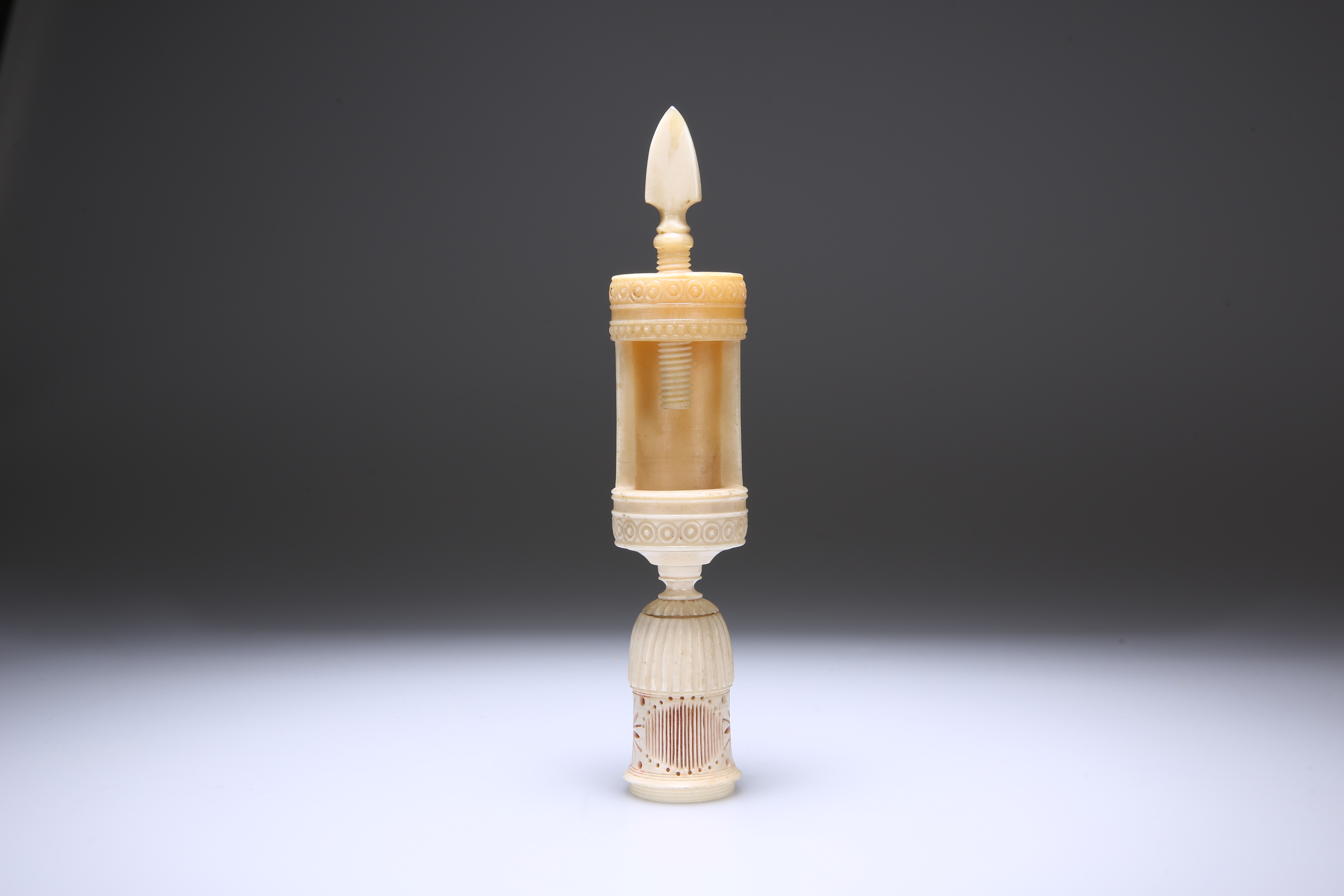 A VICTORIAN CARVED BONE SEWING CLAMP PIN CUSHION