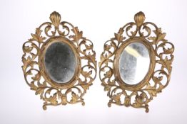 A PAIR OF 19TH CENTURY GILT-BRASS TABLE MIRRORS