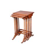 A NEST OF THREE MAHOGANY SPIDER LEG TABLES