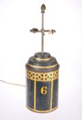 A 19th CENTURY TOLEWARE CANISTER, MOUNTED AS A TABLE LAMP