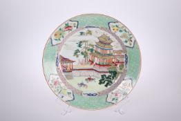 A CHINESE ENAMEL PAINTED PLATE
