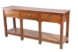 A GEORGE III OAK POTBOARD DRESSER