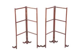 A PAIR OF EARLY 19TH CENTURY MAHOGANY FOLDING TOWEL RAILS