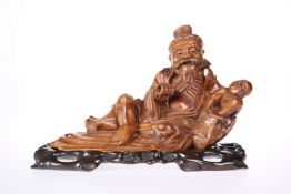 A CHINESE CARVING OF LI TIEGUAI, 19TH CENTURY