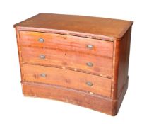 A 19TH CENTURY SATINWOOD CONCAVE CHEST OF DRAWERS