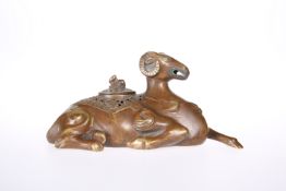 A CHINESE BRONZE CENSER OF A GOAT