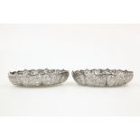 A PAIR OF CHINESE PIERCED SILVER BOWLS, C.1900
