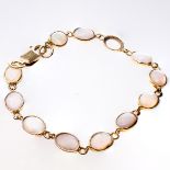 AN 18CT YELLOW GOLD AND OPAL BRACELET