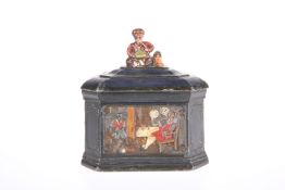 A MID-VICTORIAN PAINTED LEAD TOBACCO BOX