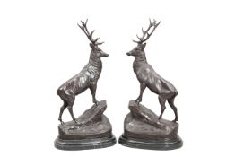 A LARGE PAIR OF BRONZE STAGS