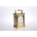 A LATE 19th CENTURY GILT-BRASS CARRIAGE CLOCK