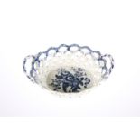 A FIRST PERIOD WORCESTER BLUE AND WHITE PINE CONE PATTERN BASKET,