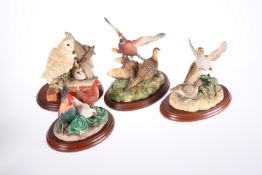 FOUR BORDER FINE ARTS MODELS, comprising "Barn Owl Family", RB34