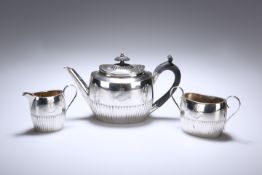 A VICTORIAN SILVER THREE PIECE BACHELOR'S TEA SERVICE, EDWARD HUTTON, LONDON 1886 AND 1887