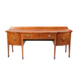 A GEORGE III INLAID MAHOGANY BREAKFRONT SIDEBOARD