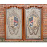 A PAIR OF WALNUT FRAMED HATCHMENTS