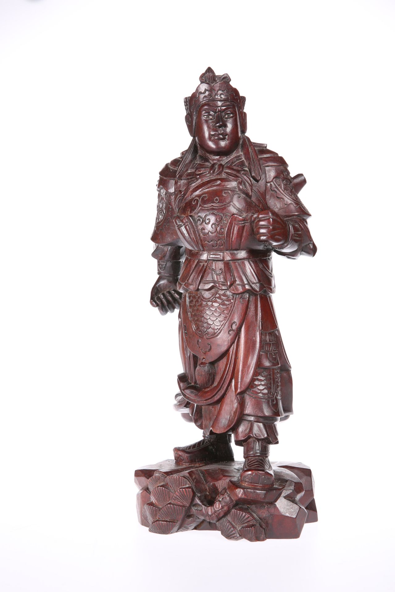 A CHINESE CARVED ZITAN FIGURE
