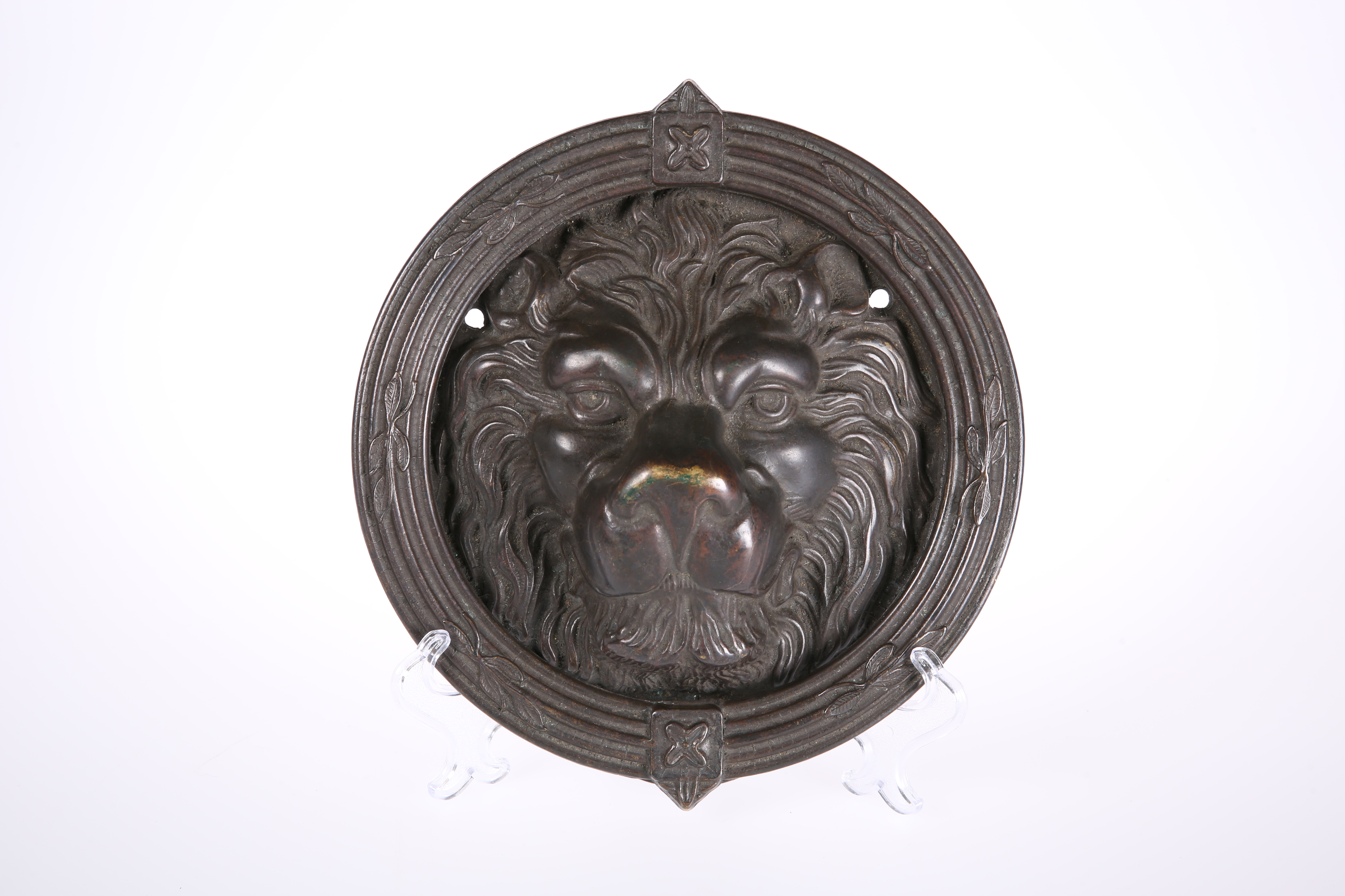 A PATINATED BRONZE LION MASK DOOR KNOCKER, EARLY 19th CENTURY