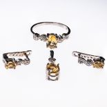 A 9CT WHITE GOLD AND CITRINE RING
