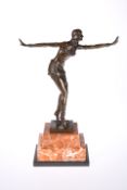 AN ART DECO STYLE BRONZE FIGURE OF A DANCER