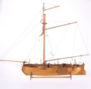 A WOODEN MODEL OF A GALLEON
