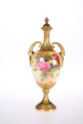 A ROYAL WORCESTER VASE AND COVER