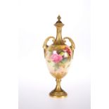 A ROYAL WORCESTER VASE AND COVER