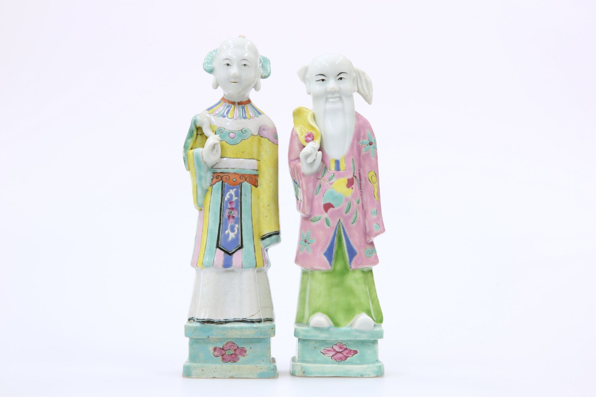 A PAIR OF CHINESE POLYCHROME FIGURES OF IMMORTALS