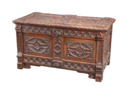 A FLEMISH CARVED OAK CHEST, 17TH CENTURY