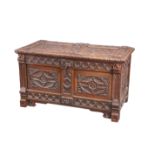 A FLEMISH CARVED OAK CHEST, 17TH CENTURY