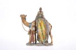 AN EARLY 20TH CENTURY PAINTED SPELTER TABLE LIGHTER