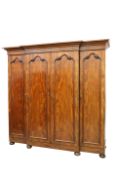 A VICTORIAN MAHOGANY FOUR-DOOR BREAKFRONT WARDROBE