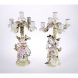 A PAIR OF DRESDEN PORCELAIN FIGURAL FIVE-LIGHT CANDELABRA