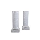 A PAIR OF VEINED GREY MARBLE COLUMNS