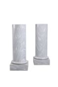 A PAIR OF VEINED GREY MARBLE COLUMNS