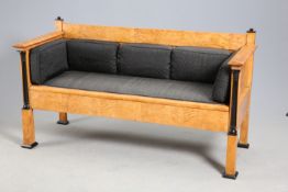 A BIEDERMEIER SATIN BIRCH AND EBONISED SOFA