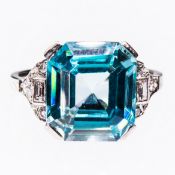 A BLUE ZIRCON AND DIAMOND RING