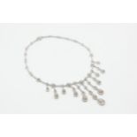 AN 18CT WHITE GOLD AND DIAMOND SET FRINGE NECKLACE