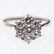 AN 18CT WHITE GOLD AND DIAMOND RING