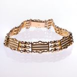 A 15CT YELLOW GOLD GATELINK BRACELET