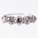 A FIVE STONE DIAMOND RING