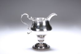 A GEORGE III SILVER BALUSTER CREAM JUG, LONDON 1768