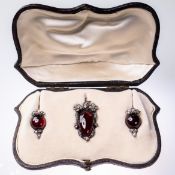 AN EARLY VICTORIAN GARNET AND DIAMOND SET DEMI-PARURE