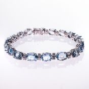 AN 18CT WHITE GOLD, AQUAMARINE AND DIAMOND BRACELET