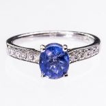 AN 18CT WHITE GOLD SAPPHIRE AND DIAMOND RING