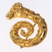 AN ETRUSCAN STYLE BROOCH