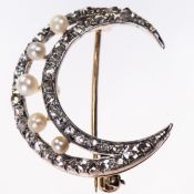 A VICTORIAN DIAMOND AND PEARL CRESCENT BROOCH