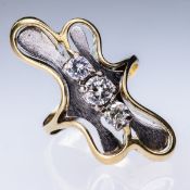 AN ABSTRACT DALI STYLE DIAMOND SET RING